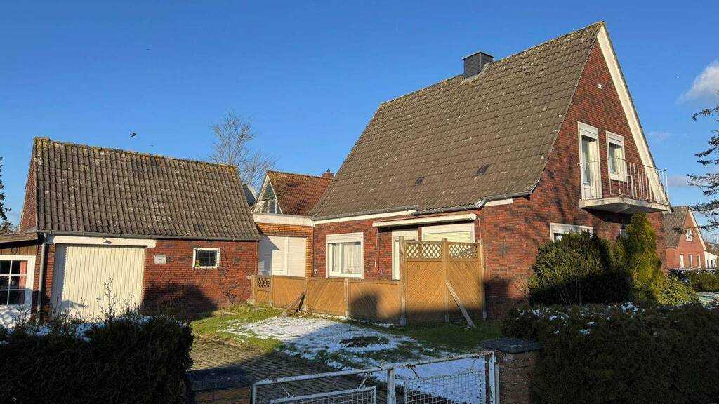 Immobilie in Jemgum - Solides Einfamilienhaus mit Garage in guter Wohnlage  - Bild 3