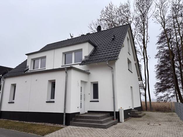 Doppelhaushälfte zum Kauf 319.000 € 4 Zimmer 106,5 m² 164 m² Grundstück Wolgast 17438