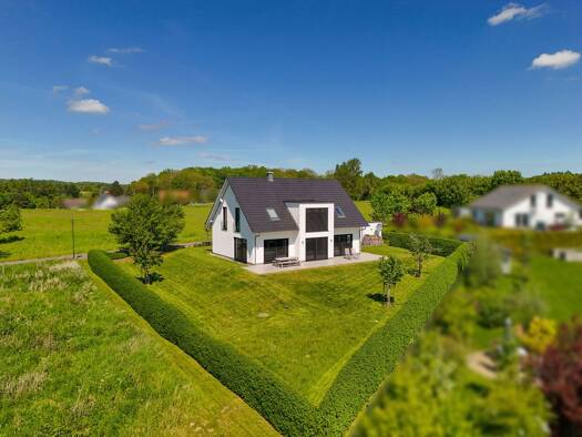 Einfamilienhaus zum Kauf 870.000 € 5 Zimmer 202 m² 1.285 m² Grundstück Jarnitz Ralswiek 18528