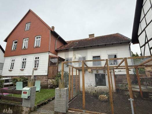 Mehrfamilienhaus zum Kauf 235.000 € 8 Zimmer 210 m² 847 m² Grundstück Hombressen Hofgeismar 34369