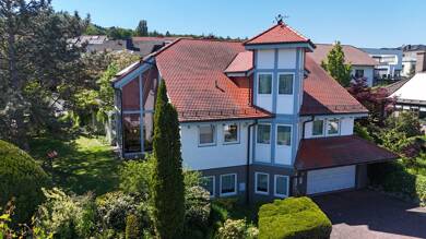 Einfamilienhaus zum Kauf 750.000 € 7 Zimmer 231,5 m² 921 m² Grundstück Großenritte Baunatal 34225