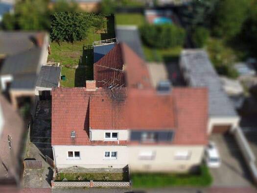 Doppelhaushälfte zum Kauf 98.000 € 4 Zimmer 110 m² 676 m² Grundstück Gröbern Muldestausee 06774