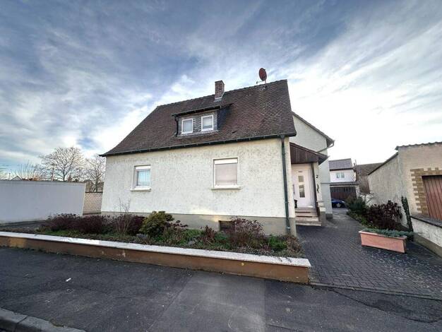 Einfamilienhaus zum Kauf 359.000 € 6 Zimmer 154,9 m² 718 m² Grundstück Stockstadt am Main 63811