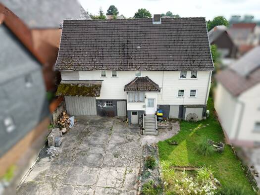 Mehrfamilienhaus zum Kauf 125.000 € 7 Zimmer 150 m² 930 m² Grundstück frei ab sofort Asterode Neukirchen 34626