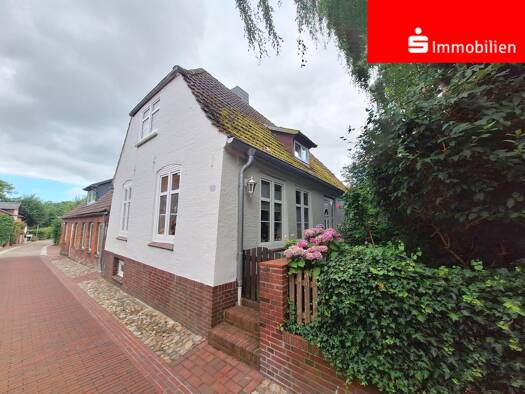 Einfamilienhaus zum Kauf 187.500 € 4 Zimmer 100 m² 194 m² Grundstück Meldorf 25704