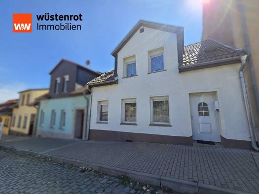 Reihenmittelhaus zum Kauf 75.000 € 85,9 m² 690 m² Grundstück Lutherstadt Eisleben Eisleben 06295