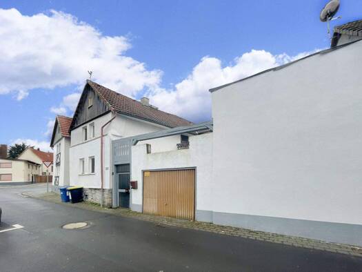 Mehrfamilienhaus zum Kauf als Kapitalanlage geeignet 260.000 € 11 Zimmer 282 m² 465 m² Grundstück Birklar Lich 35423