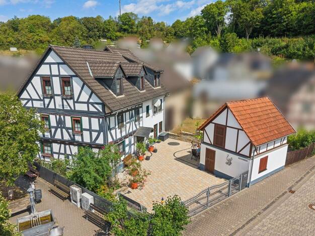 Einfamilienhaus zum Kauf 267.000 € 7 Zimmer 265 m² 346 m² Grundstück Tiefenbach Braunfels 35619