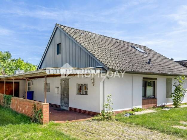 Einfamilienhaus zum Kauf 175.000 € 4 Zimmer 96 m² 1.001 m² Grundstück Phiesewarden Nordenham 26954