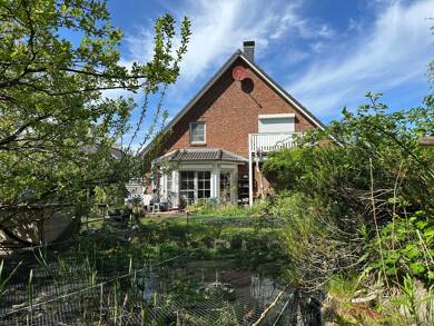Mehrfamilienhaus zum Kauf 640.000 € 8 Zimmer 189 m² 1.000 m² Grundstück Möhlenbarg 2 B Tating 25881