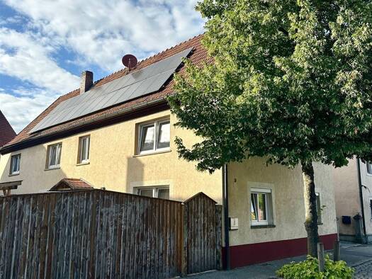 Einfamilienhaus zum Kauf 298.000 € 10 Zimmer 257,6 m² 303 m² Grundstück frei ab sofort Wonfurt 97539