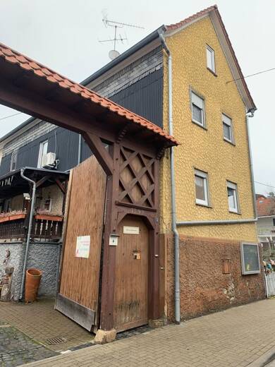 Einfamilienhaus zum Kauf 250.000 € 6 Zimmer 174 m² 470 m² Grundstück Münster Butzbach 35510