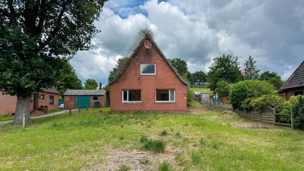 Einfamilienhaus zum Kauf 205.000 € 4 Zimmer 110 m² 1.331 m² Grundstück frei ab sofort Hennstedter Straße 31 Poyenberg 25581