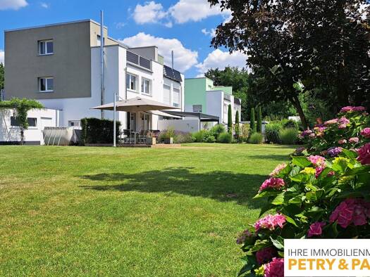 Doppelhaushälfte zum Kauf 895.000 € 4 Zimmer 151 m² 1.042 m² Grundstück Nauheim 64569