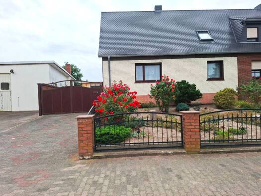 Doppelhaushälfte zum Kauf 180.000 € 3 Zimmer 100 m² 1.091 m² Grundstück Leitzkau Gommern 39279