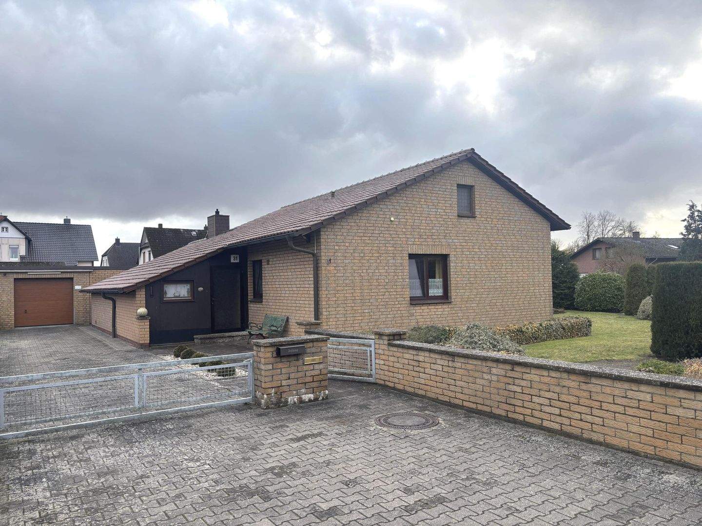 Immobilie in Wustrow - Bungalow zu ebener Erde mit Garage und Wintergarten - Bild 0