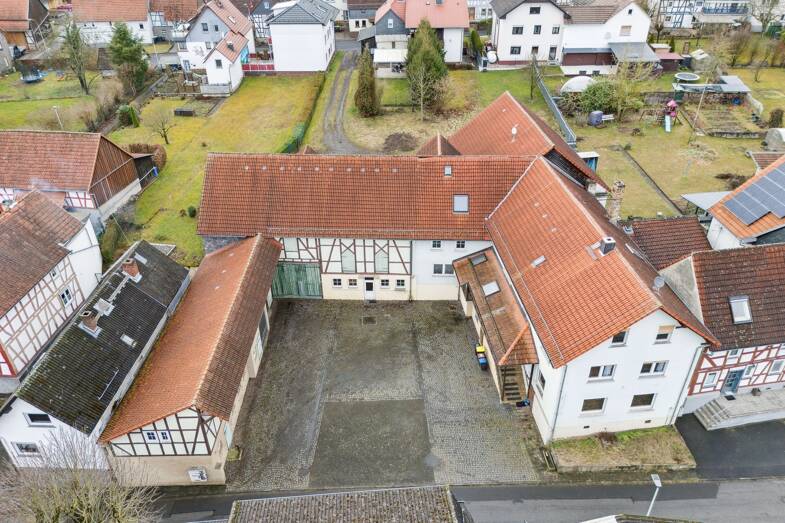 Wohn- und Geschäftshaus zum Kauf als Kapitalanlage geeignet 398.000 € 954,4 m² 1.312 m² Grundstück Merlau Mücke 35325