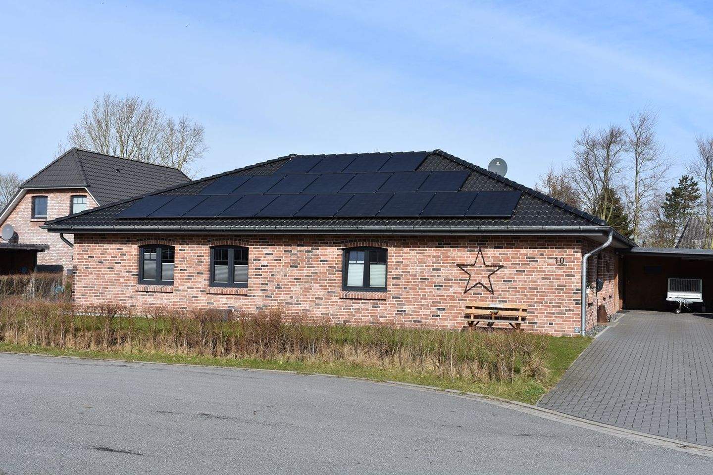 Immobilie in Bohmstedt - Neuwertiger Winkelbungalow in ruhiger Wohnlage - Bild 0