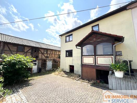 Doppelhaushälfte zum Kauf 48.500 € 4 Zimmer 105,9 m² 397 m² Grundstück Helmershausen Rhönblick / Helmershausen 98617