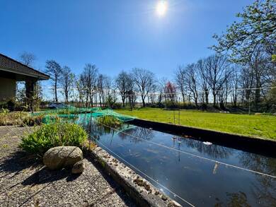 Einfamilienhaus zum Kauf 559.000 € 5 Zimmer 200 m² 6.608 m² Grundstück Sengwarden Wilhelmshaven 26388