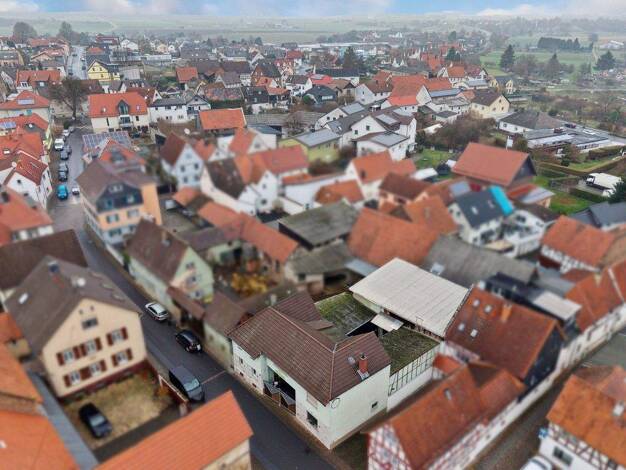 Einfamilienhaus zum Kauf 210.000 € 6 Zimmer 136 m² 410 m² Grundstück Wölfersheim 61200