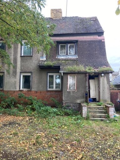 Mehrfamilienhaus zum Kauf 69.000 € 20 Zimmer 540 m² 1.001 m² Grundstück Bitterfeld Bitterfeld Wolfen 06749