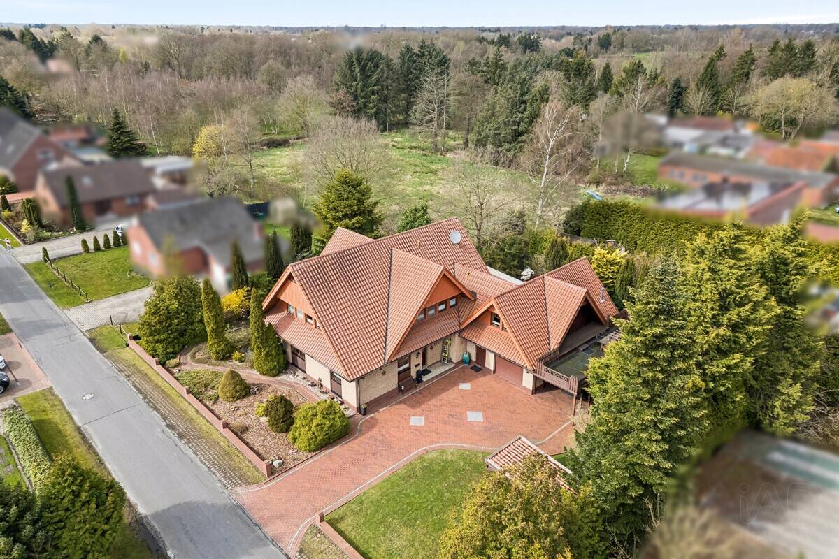 Immobilie in Ostrhauderfehn - "Großzügiges Einfamilienhaus mit Einliegerwohnung und traumhaftem Süd-West-Garten in Idafehn" - Bild 0