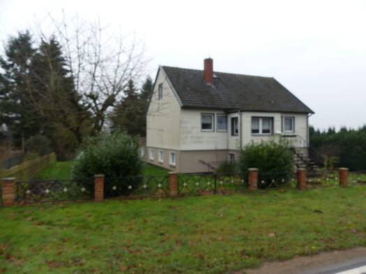 Einfamilienhaus zum Kauf 142.500 € 7 Zimmer 120 m² 500 m² Grundstück frei ab sofort Hauptstraße 3 Lübberstorf 23992