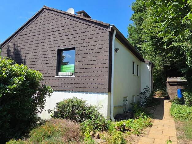 Einfamilienhaus zum Kauf 250.000 € 5 Zimmer 102,7 m² 1.021 m² Grundstück Mitte Heiligenhaus 42579