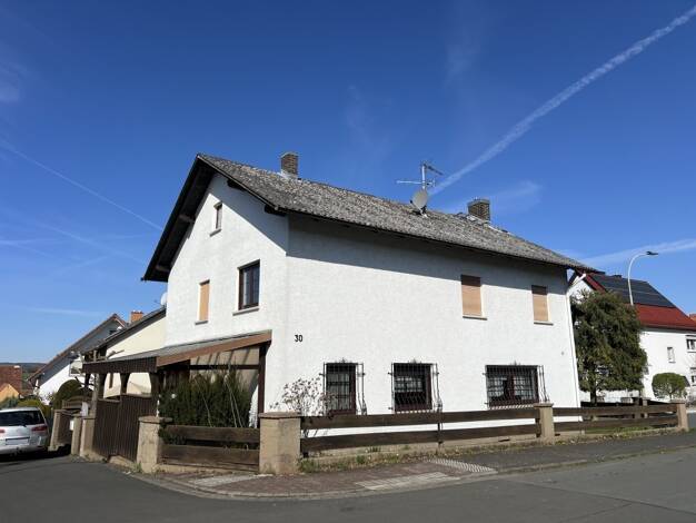 Einfamilienhaus zum Kauf 350.000 € 8 Zimmer 151,5 m² 299 m² Grundstück Langgöns Langgöns 35428
