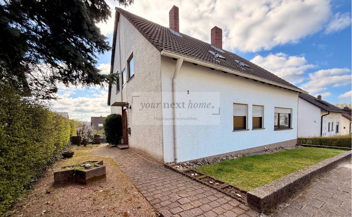 Immobilie in Friedrichsthal - Ein- bis Zweifamilienhaus in Friedrichsthal auf insgesamt ca. 163 m² mit sonnigem Garten - Bild 0