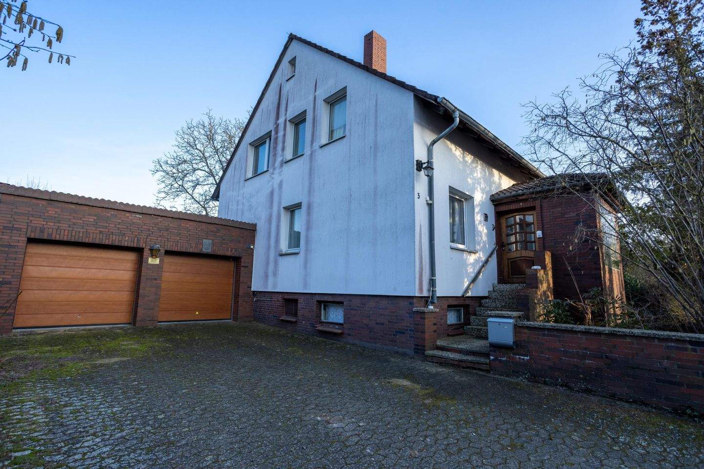 Immobilie in Adenbüttel - Freistehendes Einfamilienhaus mit Doppelgarage - viel Raum für eigene Ideen - Bild 0