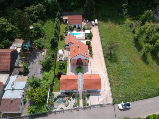 Einfamilienhaus zum Kauf 630.000 € 4 Zimmer 196 m² 1.565 m² Grundstück Silberhausen 68870