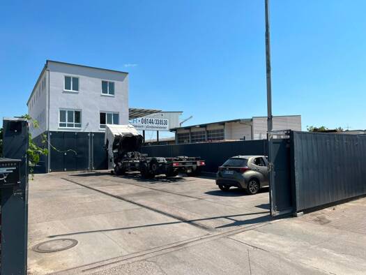 Produktionshalle zum Kauf 1.550.000 € 457 m² Lagerfläche teilbar ab 154 m² Bischofsheim 65474