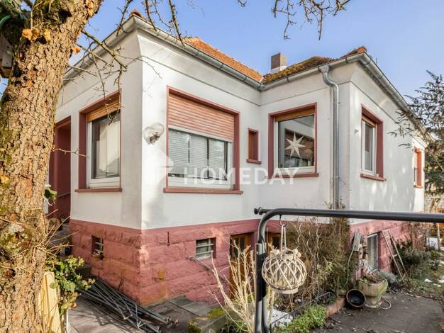 Einfamilienhaus zum Kauf 329.000 € 3,5 Zimmer 108 m² 567 m² Grundstück Rothenbergen Gründau 63584