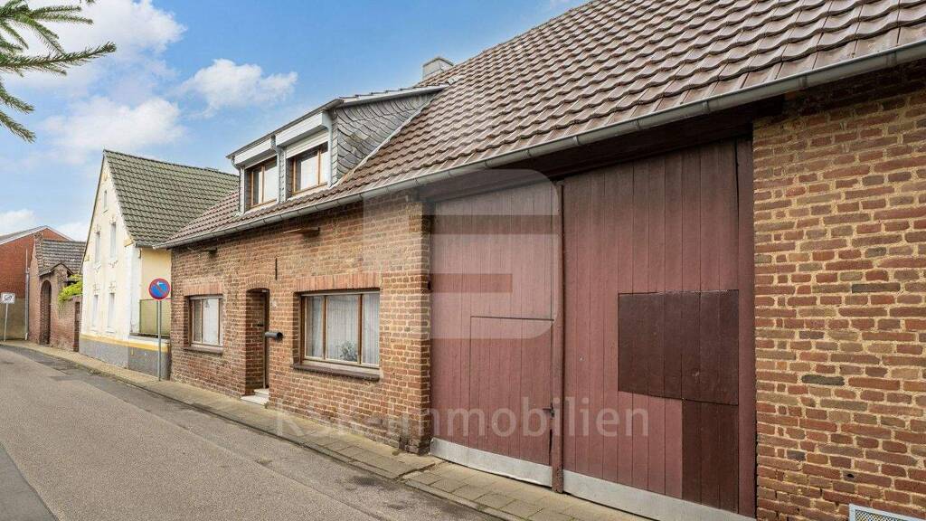 Immobilie in Bedburg - Charmantes Einfamilienhaus mit Innenhof und großem Garten! - Bild 2