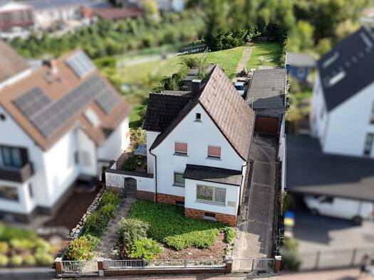 Einfamilienhaus zum Kauf 675.000 € 4,5 Zimmer 109,5 m² 920 m² Grundstück Dortelweil Bad Vilbel 61118