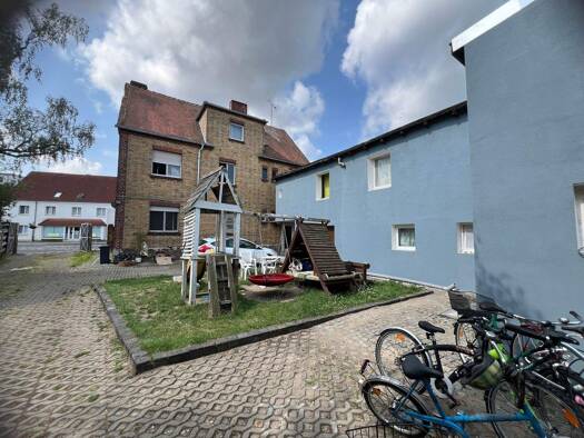 Wohn- und Geschäftshaus zum Kauf als Kapitalanlage geeignet 200.000 € 18 Zimmer 400,8 m² 1.220 m² Grundstück Wolfen Bitterfeld-Wolfen 06766