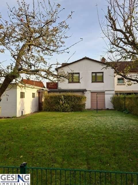 Immobilie in Mölln - Für pfiffigen Handwerker - Endreihenhaus mit schönem Garten und großer Garage - Bild 0