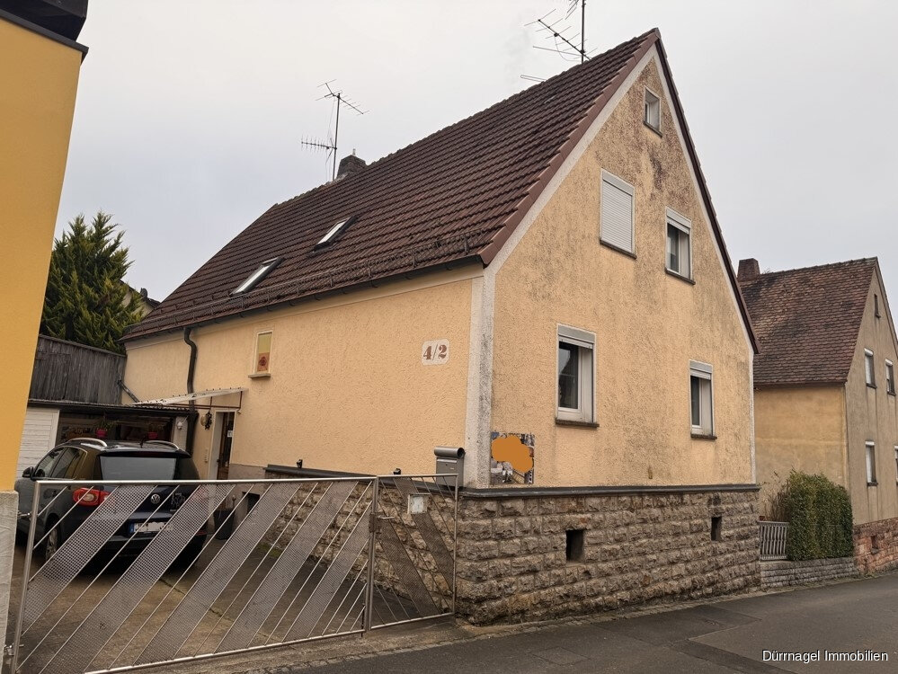 Einfamilienhaus zum Kauf 269.000 € 5 Zimmer 150 m²<br/>Wohnfläche 350 m²<br/>Grundstück Eisingen 97249