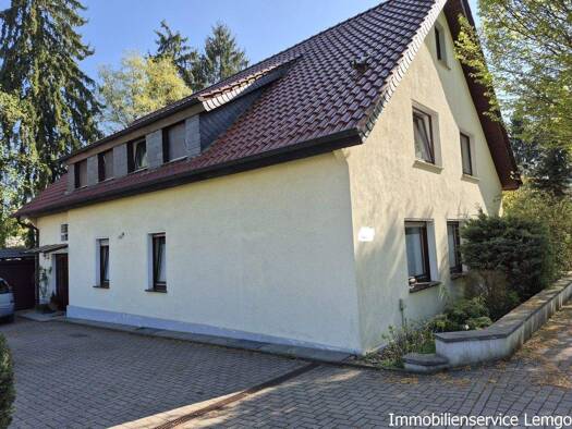 Einfamilienhaus zum Kauf 389.000 € 9 Zimmer 200 m² 2.195 m² Grundstück frei ab sofort Zur Langen Grund Brüntorf Lemgo 32657