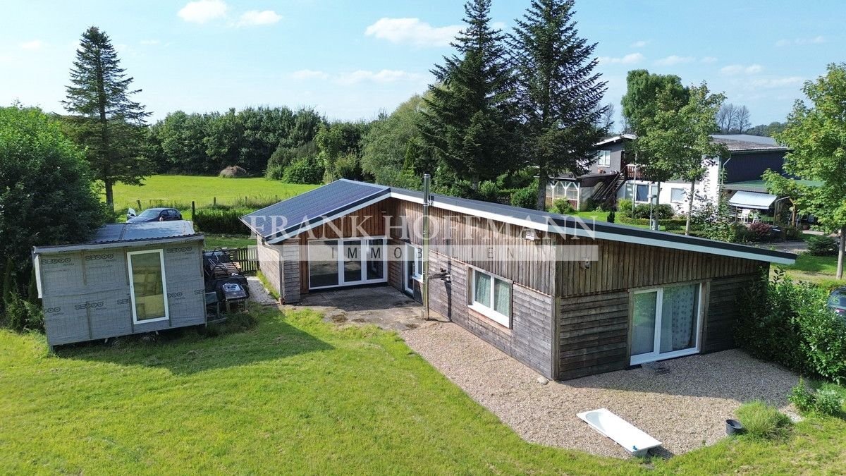 Bungalow zum Kauf 329.000 € 3,5 Zimmer 120 m²<br/>Wohnfläche 2.054 m²<br/>Grundstück Alveslohe 25486