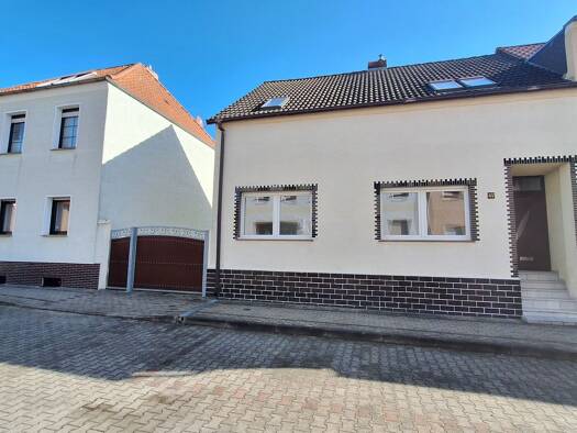 Doppelhaushälfte zum Kauf 130.000 € 3 Zimmer 119 m² 675 m² Grundstück frei ab sofort Mützelstraße 49 Genthin Genthin 39307