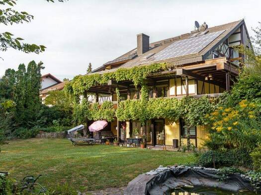 Einfamilienhaus zum Kauf 599.000 € 7 Zimmer 216 m² 1.100 m² Grundstück Heuchelhof Würzburg / Rottenbauer 97084