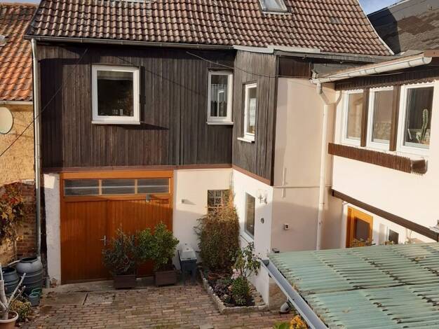 Reihenmittelhaus zum Kauf 95.000 € 8 Zimmer 133 m² 440 m² Grundstück Schkölen 07619