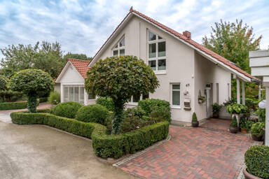 Mehrfamilienhaus zum Kauf 595.000 € 7 Zimmer 246 m² 1.892 m² Grundstück Hostemost Rastede 26180