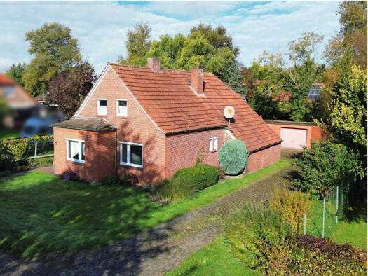 Einfamilienhaus zum Kauf 149.000 € 4 Zimmer 99 m² 1.041 m² Grundstück Rhaudermoor Rhauderfehn 26817
