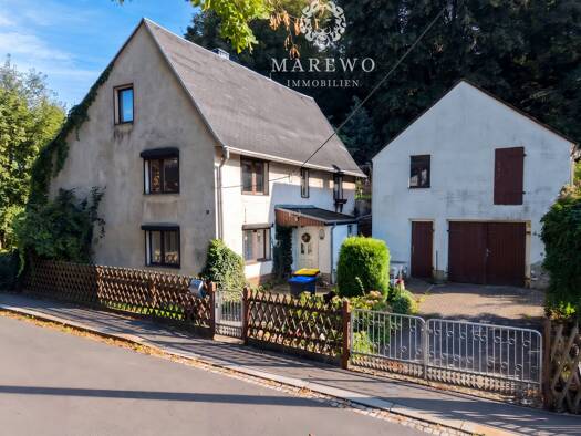 Einfamilienhaus zum Kauf 59.000 € 7 Zimmer 145 m² 2.520 m² Grundstück frei ab sofort Hauptstraße 18 Tragnitz Leisnig 04703
