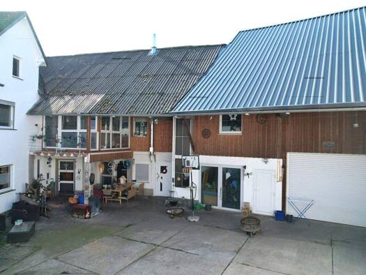 Mehrfamilienhaus zum Kauf provisionsfrei 329.000 € 10 Zimmer 320,8 m² 427 m² Grundstück Schwalbach Schöffengrund / Schwalbach 35641