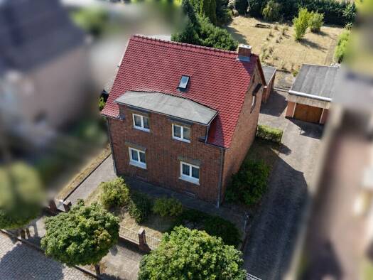 Einfamilienhaus zum Kauf 145.000 € 5 Zimmer 129 m² 991 m² Grundstück Wolfen Bitterfeld-Wolfen 06766